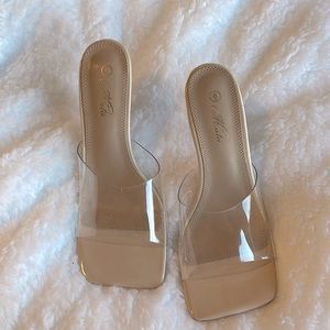 Tan, clear straps, square toes, 4 inch heel.